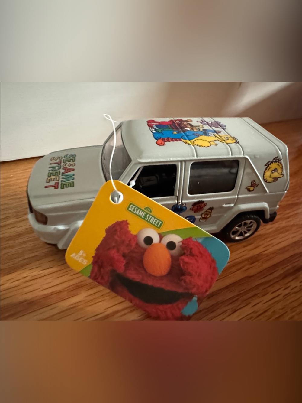 Sesame Street Silver Mini Van with Colorful Character Art doors open NEW w tags